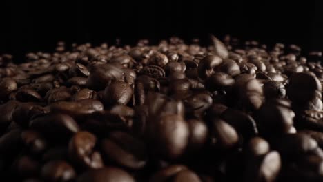 Zoom-out-macro-video-of-falling-coffee-beans